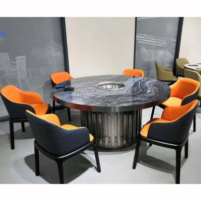 China Customization Luxury Round Shabu Shabu Hotpot Restaurant Hot Selling Smokeless Dining Table With Stainless Steel Base for sale