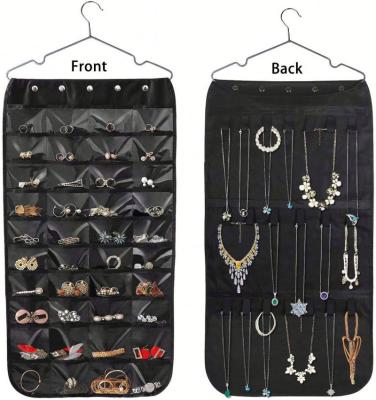 China Viable Double Sided Hanging Jewelry Organizer 40 Pockets and Magic Strip 20 Hook Jewelry Organizer for sale