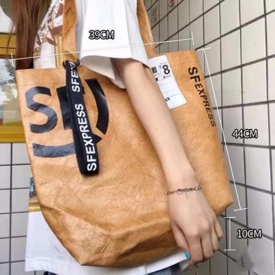 China Wholesale Fashionable Pattern Washing Pattern Promotion Advertising Paper Bag One-shoulder Handle YIMYIK Printed Logo Canvas One-shoulder Waterproof Bag for sale