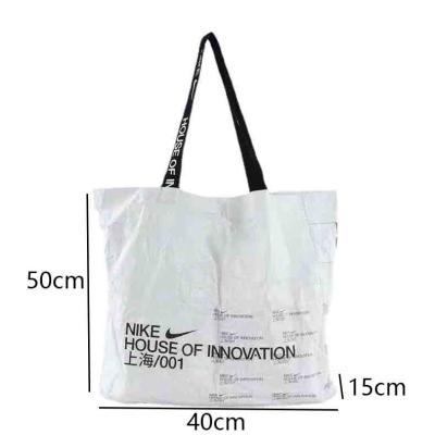 China Custom Rope Handle YIMYIK Dupont Handbag Shoulder Gift Paper Shopping Bag Printed Logo Retro Waterproof Tyvek Bag for sale