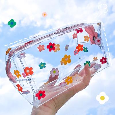 China Fashionable Lady YIMYIK Best-price PVC Wash Bag Heart Flower Zipper Travel Transparent Cosmetic Bag for sale