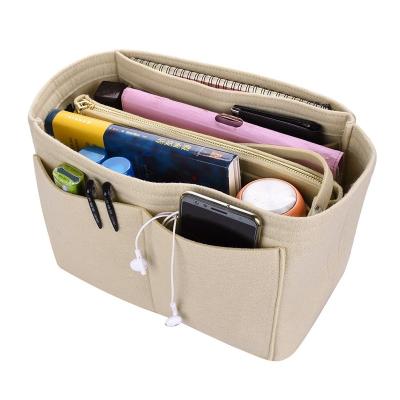 China Lady YIMYIK Wholesale Fancy Makeup Organizer Insert Bag Pure Color Felt Portable Cosmetic Bag for sale