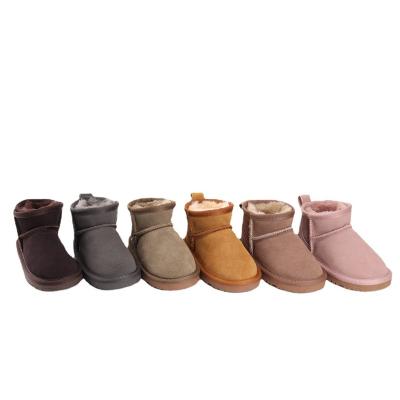 China Round Winter hot selling new warm and non-slip designer brand-name kids fur boots cowhide kids snow boots for sale