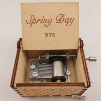 China Custom Logo Songs Spring Day Wooden Music Box Mini Music Boxes Bts Video Gift for sale