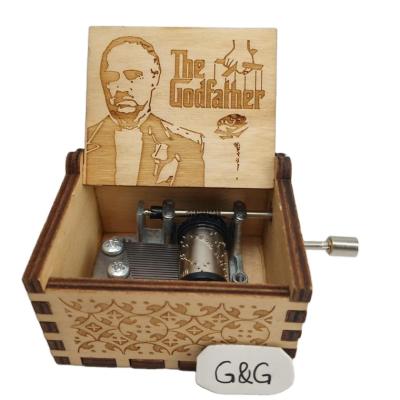 China Make Music New Best Selling Wooden Hand Crank Music Box Godfather Diy for sale