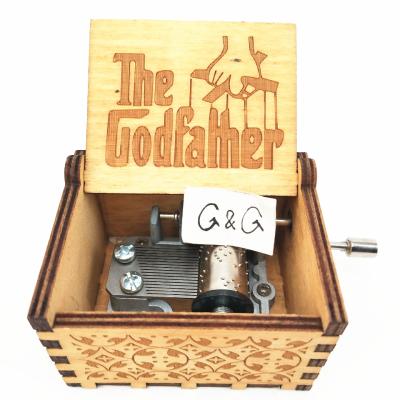 China Custom Gift Movie Series Operate The Godfather Wooden Hand Crank Music Box for sale