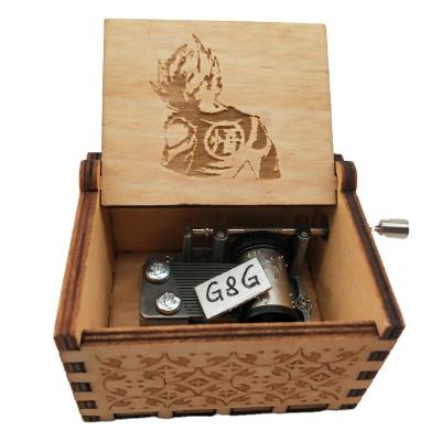 China Dragonball Custom Songs Gift Wooden Hand Crank Music Box for sale