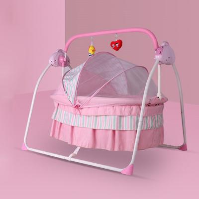 China Baby Swing Bed Easy Folding Electric Baby Rocking Bed With Mosquito Net Music for sale