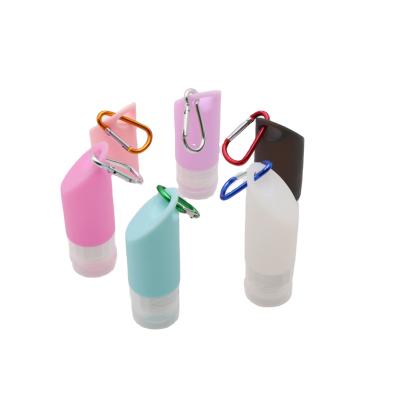 China Silicone Cosmetic Cosmetics Travel Portable Dispenser Key Chain Soap Shampoo Sanitizer Dispenser Bottle for sale