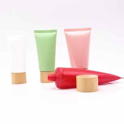 China 20g 30g 50g 60g 100g cosmetic pe squeeze plastic tubes with acrylic lids for skin care cosmetics plastic tube for sale