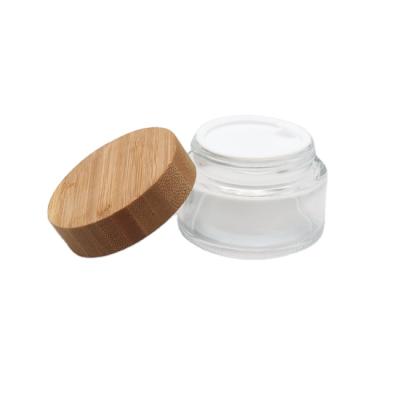 China Hot Selling Cosmetic Frosted Glass Bottle Cosmetic Wide Mouth Cosmetic Packaging Jar Fancy Glass Jars for sale