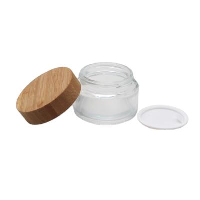 China Wholesale 15g 20g 30g 50g Cosmetic Cream Containers Clear Glass Jar With Bamboo Wooden Lid for sale