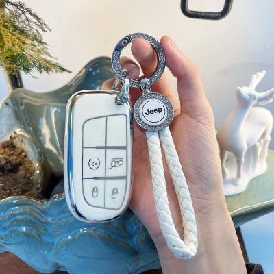 China Waterproof/no dust folding exterior 4 button key car styling TPU car key case cover for Jeep Renegade Compass for sale