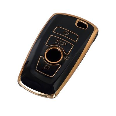 China Waterproof/no dust China Best Price Hot-selling Tpu Car Key Case Golden Holder For Car Key For BMW Car Keys Case for sale