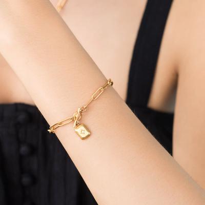 China TRENDY Bayes Simple Design 18k Gold Plated Stainless Steel Paperclip Chain Bracelet Square CZ Stone North Star Pendant Bracelet for sale