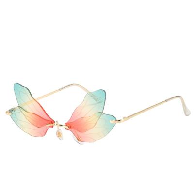 China Fashion New Design Sunglasses Women Frameless Fairy Wings Gradient Brand Sun Glasses for sale