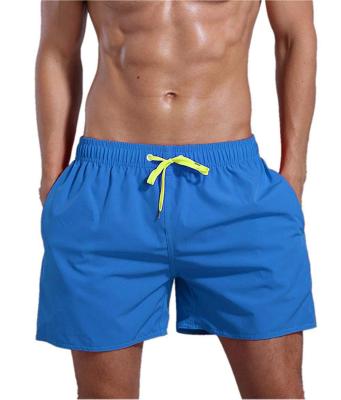 China New Design QUICK DRY Custom Made Mens Beach Shorts 65% Cotton 35% Spandex Simple Color Swim Shorts With Phone Pocket for sale