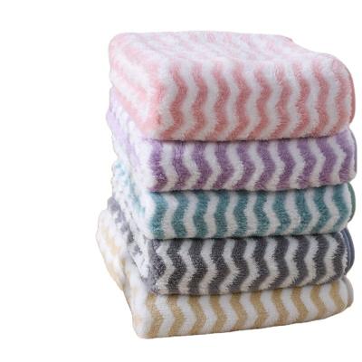 China Hypoallergenic New style super soft skin-friendly comfortable absorbent warp knitted coral fleece cationic bath towel for sale