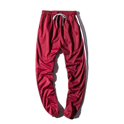 China Anti-wrinkle Mens Three-stripe Leisure Pants Big Size Track Pants Slim Fit Sports Pants for sale