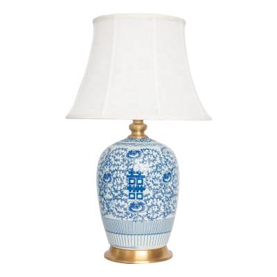 China Chinese handicraft blue and white wax gourd shaped all-copper ceramic bedside table lamp for hotel and villa for sale