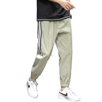 China 2022 Anti-Wrinkle Top Rank Mens Stretch Sweatpants Gym Joggers Pants Side Stripes Mens Trousers Cargo Pants For Men for sale