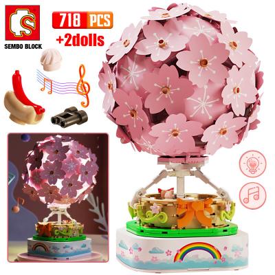 China Sakura Hot Air Balloon Friends Building Blocks City Street View Cherry Blossoms Music Box House Plastic Creative Brick Toys For Children for sale