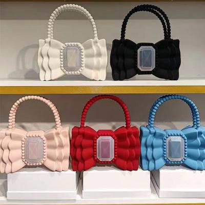 China High Quality 2021 Bow Silica Gel Jelly Handbag For Women Solid Kawaii Purses Designer Solid Kawaii Ladies Day Clutch Purse Cute Sweet High Quality for sale