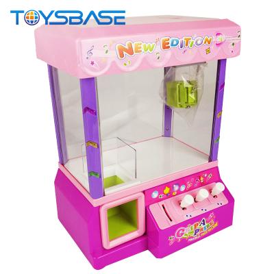 China Plastic Wholesale Electronic Candy Machine Game Kids Pretend Game Claw Grabber Toy for sale