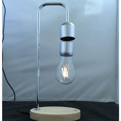 China ABS Wooden Base 360 ​​Rotation Magnetic Hanging Light Table Led Levitation Floating Light Lamp for sale