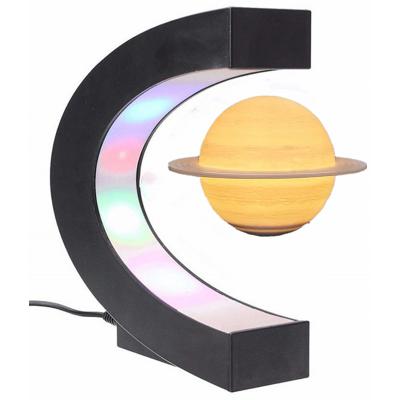 China ABS In Night Light Led Constellation Ball Floating Saturn Electromagnetic Levitation Table Lamp for sale