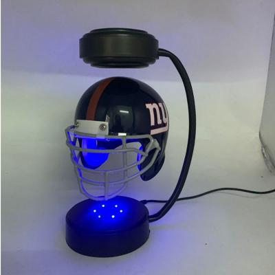 China New ABS Factory The Same Magnetic Levitation Football Helmet Floating Display Racks for sale