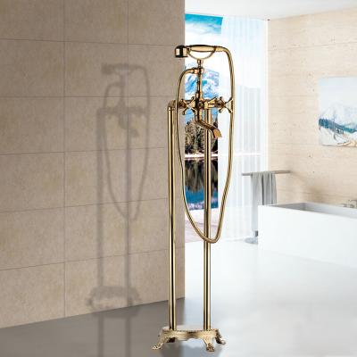 China Without Slide Bar Gold JIENI Multifunctional Floor Mount Tub Filler Faucet Set With Hand Held Shower Brass Mixer Taps for sale