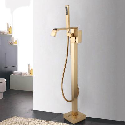 China Without Slide Bar Square Floor Mount JIENI Bathtub Filler Swept Free Standing Shower Faucet Gold for sale