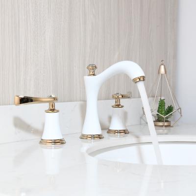 China Widespread Mixer Holes Sink 3 Hole Waterfall Faucet Basin Taps JIENI White And Gold Metered Bathroom Faucets for sale