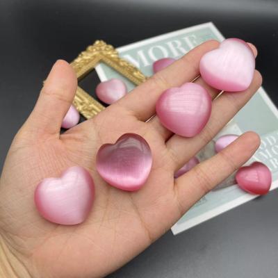 China Cheap Natural Crystal Pink Heart Aura Cat Eye Europe Stone Fengshui Healing Folk Crafts Stone Wedding Gifts for sale