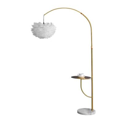 China Modern Feather Lights Modern Resin Copper Hotel Brass Palm Lamp Ostrich Feather Holder LED Light Nordic Luxury Standing Floor Lamp for sale