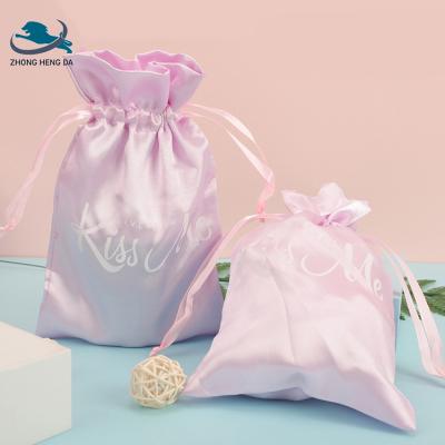 China Customizable Light Pink Satin Gift Drawstring Large Packaging Drawstring Bags for sale