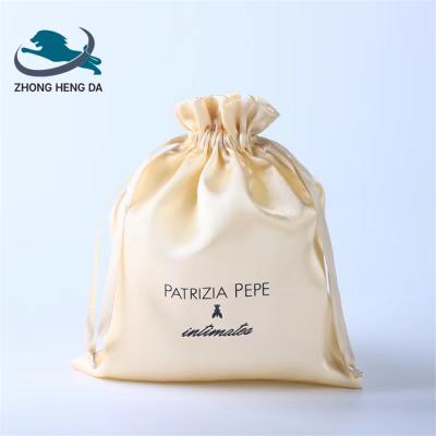 China 2021 hot sale dustproof storage soft silk cream satin 12x12 drawstring bag of gift for sale