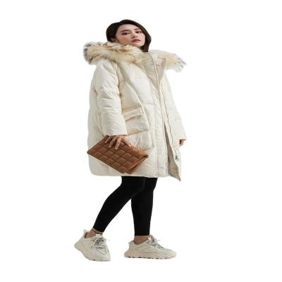 China Breathable Custom Made White Duck Down Jacket Winter Down Long Coats For Women With Faux Fur Hood for sale