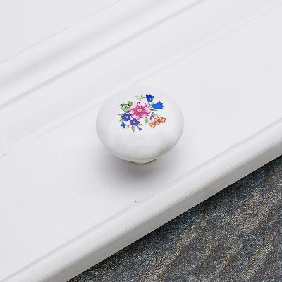 China Contemporary Single Head Ceramic Furniture Hardware Drawer Dresser Wardrobe Cabinet Handle Cupboard Knob Pull for sale