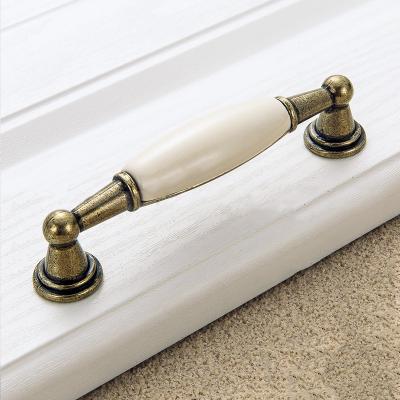 China Contemporary Wholesale Chinese Ceramic Zamak Drawer Dresser Wardrobe Cabinet Cupboard Cupboard Handle Pull for sale