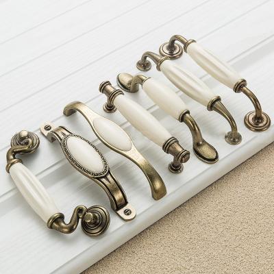 China Contemporary Newcomers Furniture Chinese Ceramic Cutout Handle Pull Out Drawer Cupboard Handle Pull for sale