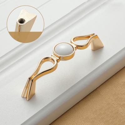 China Contemporary luxury white cutout furniture hardware gold drawer dresser sideboard wardrobe handle pull for sale