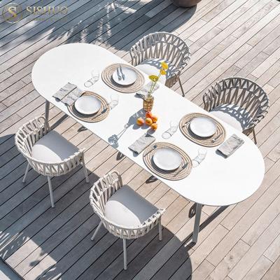 China Outdoor Weather Furniture Customize Waterproof Aluminum Frame Garden Beach Table And Chairs Sets Outdoor Seaside Pool Patio Wicker Rattan Chair for sale