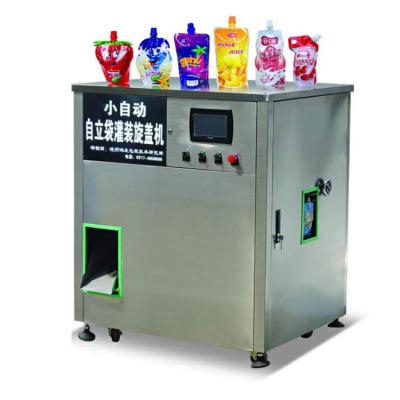 China Automatische Saft-Beutel-Füllmaschine-, Füllenund Mit einer Kappe bedeckenmaschine zu verkaufen