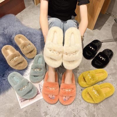 China Fashion Trend Autumn New Design Women's Plush Slippers With Pearl Buckle Flat Bottom Slippers for sale