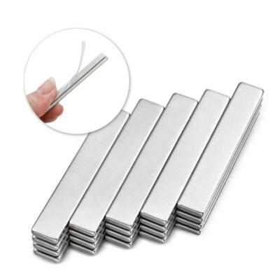 China Custom Super Strong Magnet Environmentally Friendly N52 60 x 20 x 10mm Rectangular Neodymium Permanent Magnets for sale