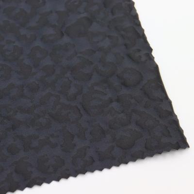 China High-stretch polyester spandex coupling stretch coating film fabric for sportswear yogawear swimwear for sale