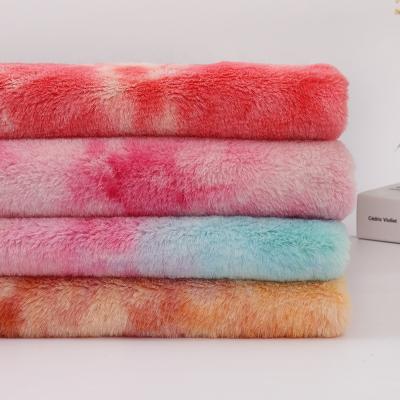 China Wholesale 100% Polyester Tie Dye Plush Fabric Faux Rabbit Fur Tear-Resistant Fabric For Coat for sale