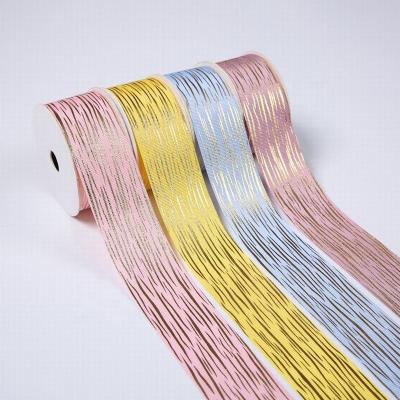 China Sunjoy Corduroy High Tenacity Shiny Gold Foil Glitter Satin Ribbon For Crafts With Custom Shape 1-150cm Width for sale